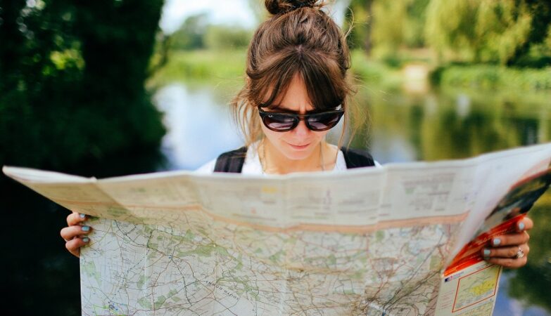Woman looking at map