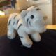 a stuffed animal tiger, Rocky